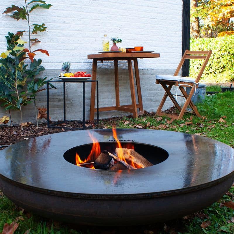 BonFeu Plancha on BonBowl fire pit with open flame