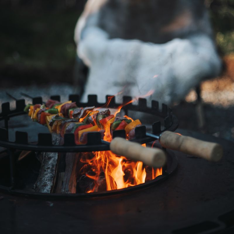 BonFeu BonSkewers in use over a fire pit
