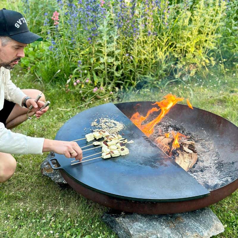 BonFeu Plancha Half Circle in use cooking food