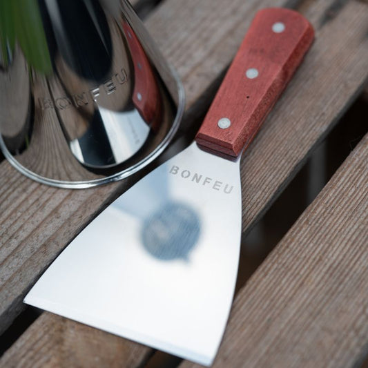 BonFeu Spatula shown with BonFeu Oil Can