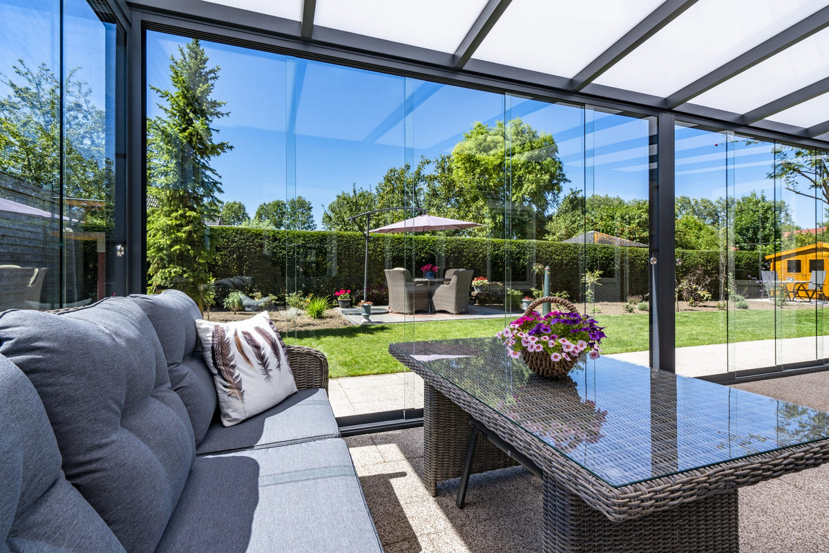 Deponti Bosco aluminium veranda attached to a house exterior
