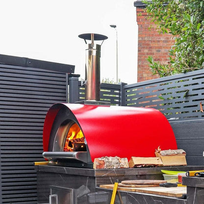 Clementi Original Wood Fired Pizza Oven in red, lifestyle shot