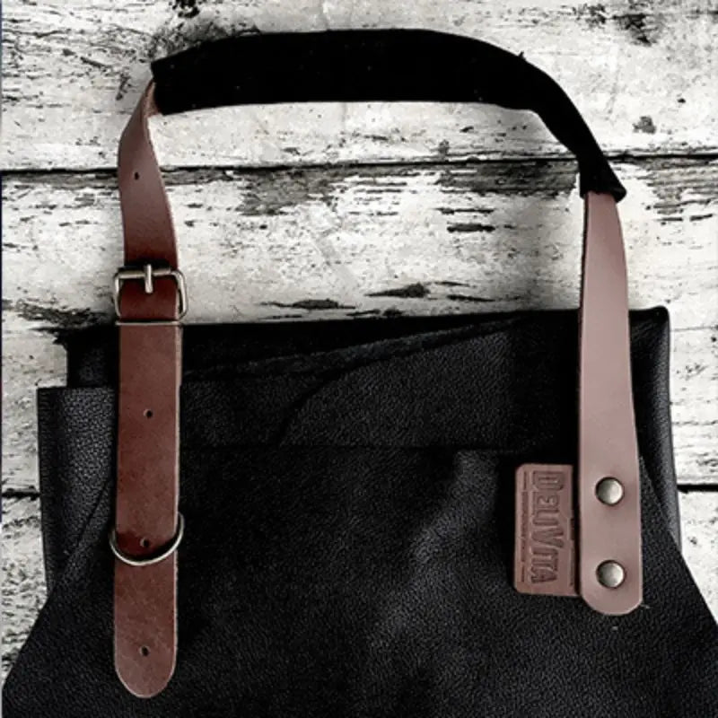DeliVita Leather Cooking Apron worn while cooking