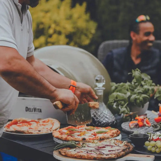 DeliVita Olive Green wood fired pizza oven, lifestyle shot 5