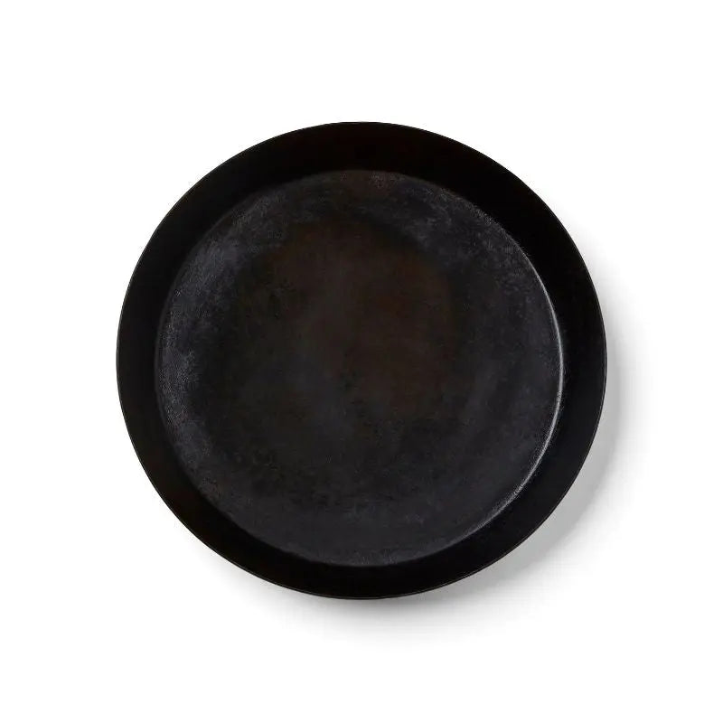 DeliVita round iron dish on white background