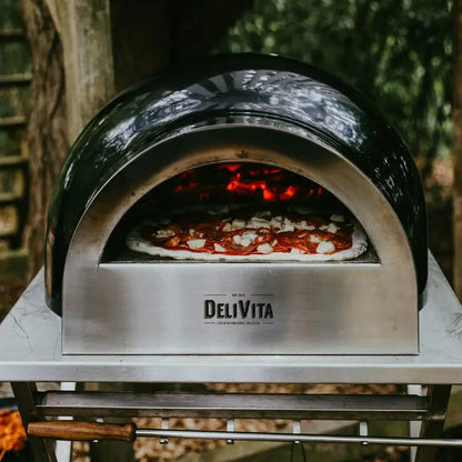 DeliVita Very Black wood fired pizza oven, lifestyle shot 1