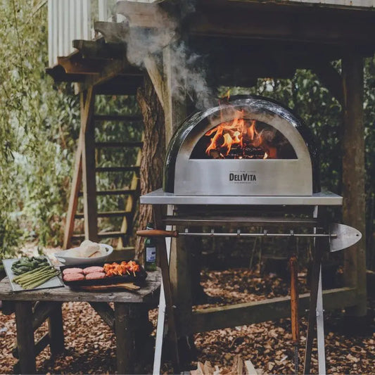 DeliVita Very Black wood fired pizza oven, lifestyle shot 3