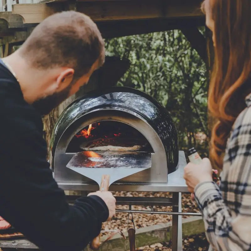 DeliVita Very Black wood fired pizza oven, lifestyle shot 5
