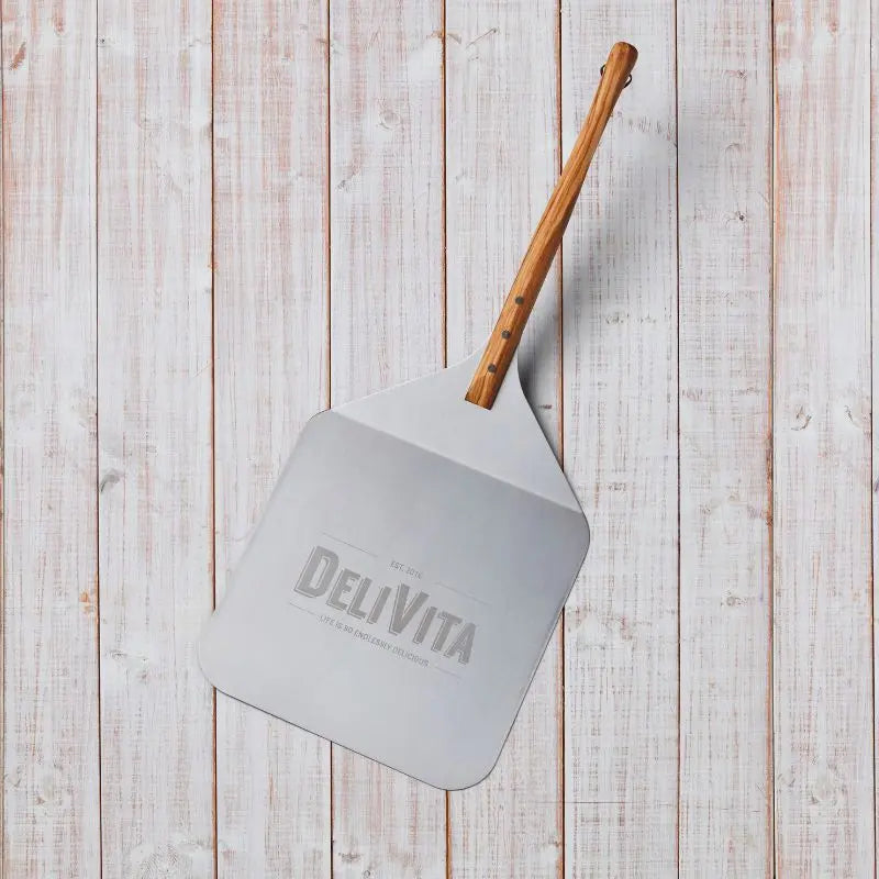 DeliVita Pizza Peel in use loading pizza