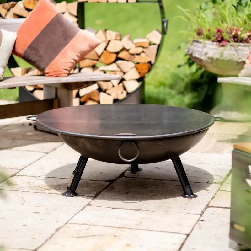 Firepits UK Flat Table Top Lid used at an outdoor gathering