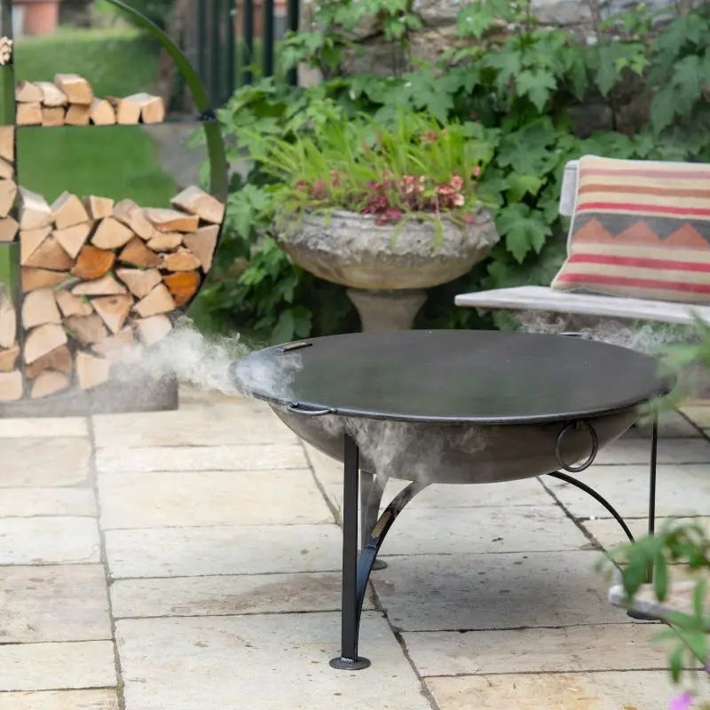 Firepits UK Flat Table Top Lid holding drinks outdoors