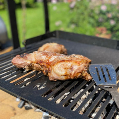 Firepits UK Katherine Wheel BBQ grilling chicken