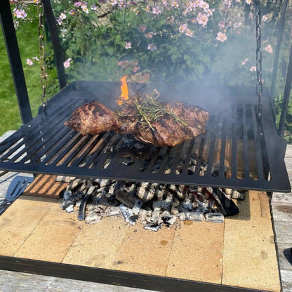 Firepits UK Katherine Wheel BBQ grilling meat