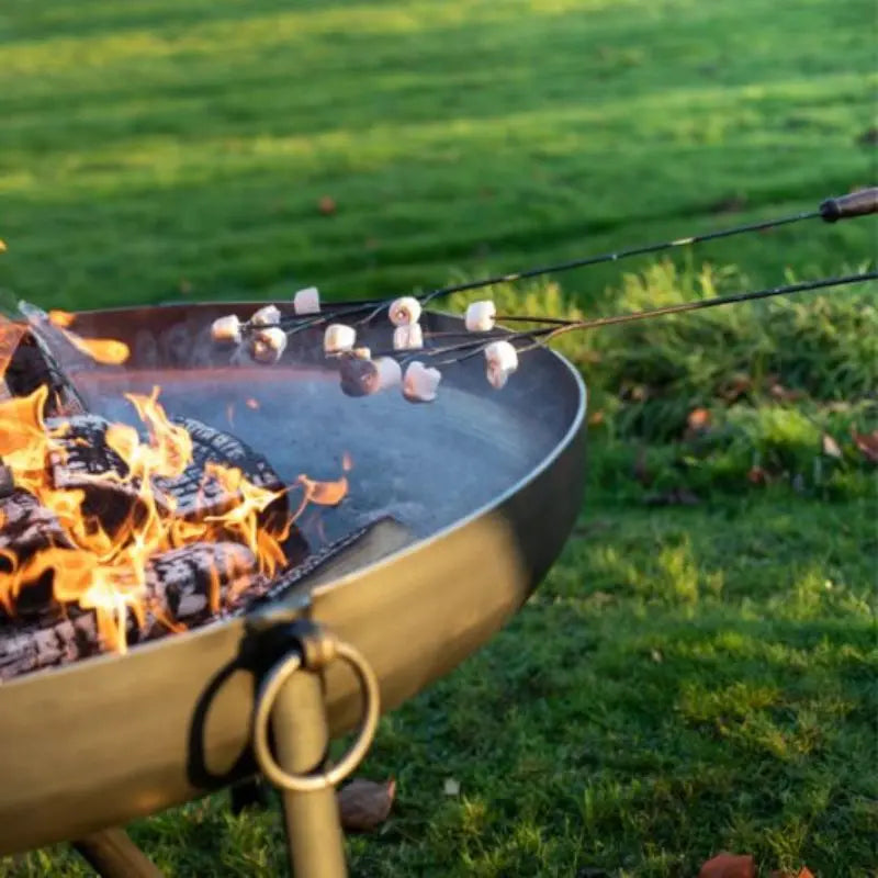 Firepits UK Marshmallow Fork held over a fire pit
