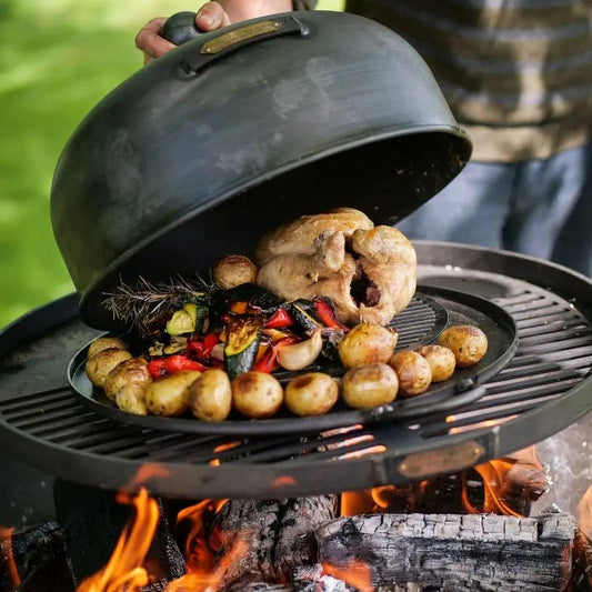Firepits UK Roasting Oven in use over a fire pit