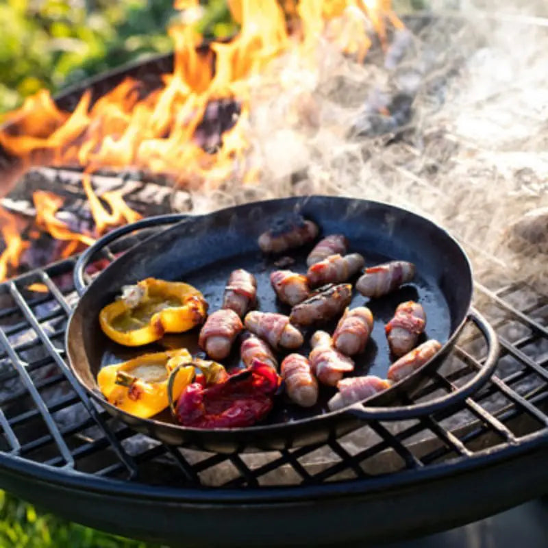 Firepits UK Skillet Pan cooking outdoors