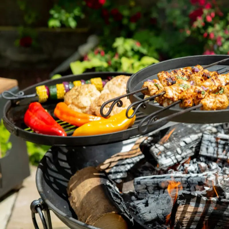Firepits UK Warming Swing Arm BBQ Rack over a fire pit