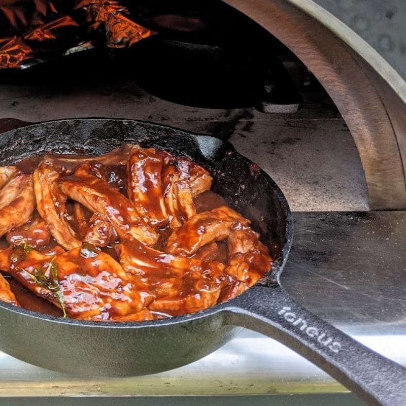 Igneus 3 Part Cast Iron Pan Set in use, lifestyle shot 3