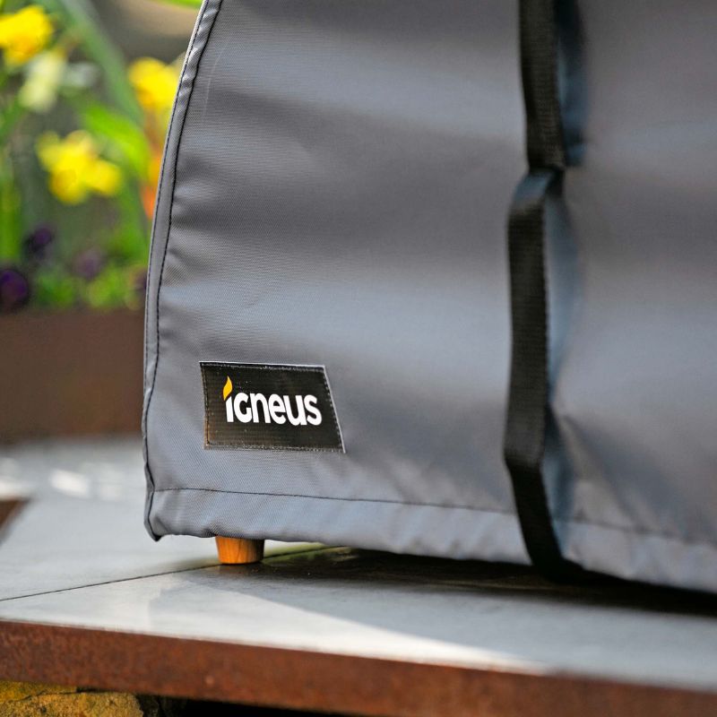 Igneus Classico Pizza Oven Cover in a garden setting
