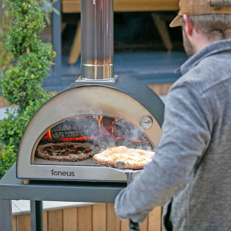 Igneus Classico wood fired pizza oven cooking two pizzas